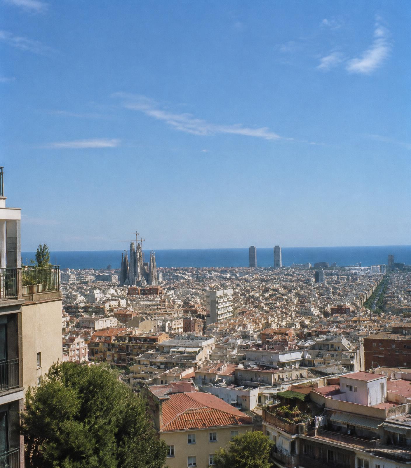 Barcelona rooftops, the Sagrada Família and the Mediterranean seen from a city viewpoint